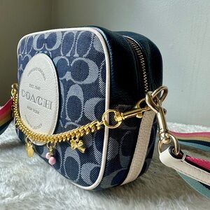 Coach Dempsey Camara bag in denim with rainbow strap and charm